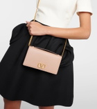 Valentino Garavani VLogo Signature Mini leather wallet on chain