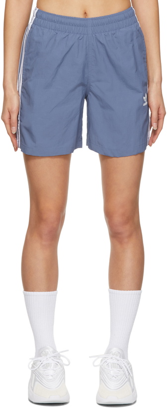 Photo: adidas Originals Blue Adicolor Classics 3-Stripes Swim Shorts