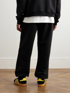 SKY HIGH FARM - Tapered Logo-Print Organic Cotton-Jersey Sweatpants - Black