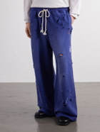 Satoshi Nakamoto - Luke Logo-Printed Paint-Splattered Distressed Cotton-Jersey Drawstring Sweatpants - Blue