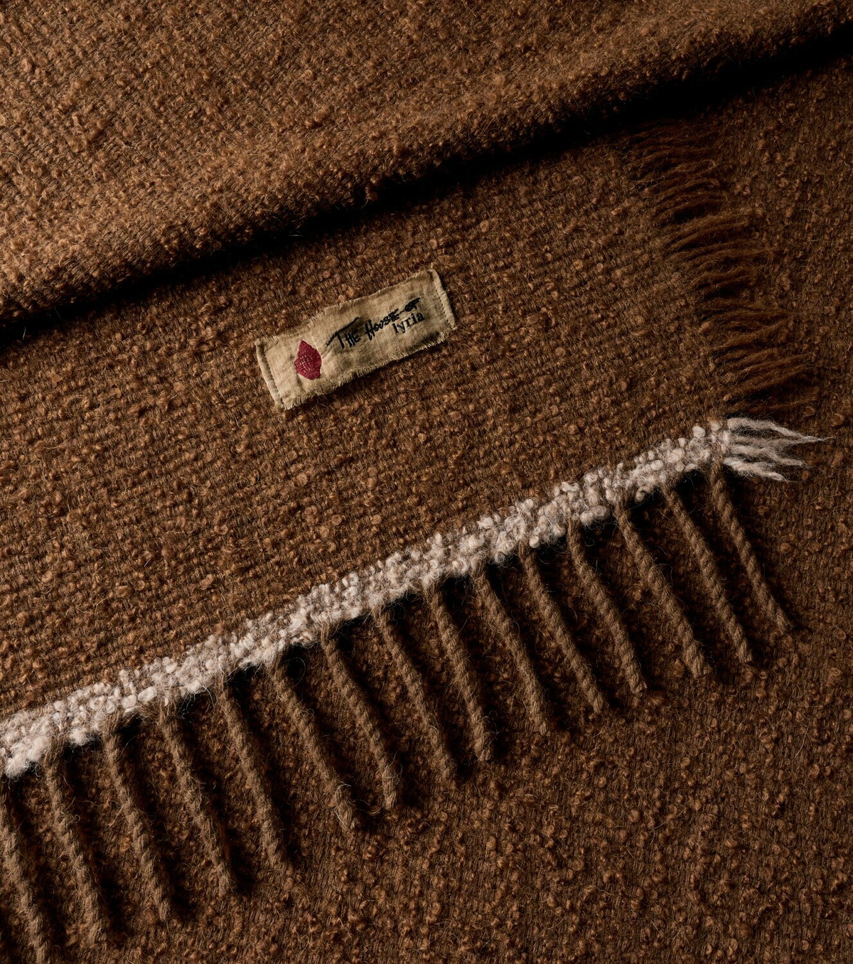 The House of Lyria Garison alpaca, wool, and cashmere throw