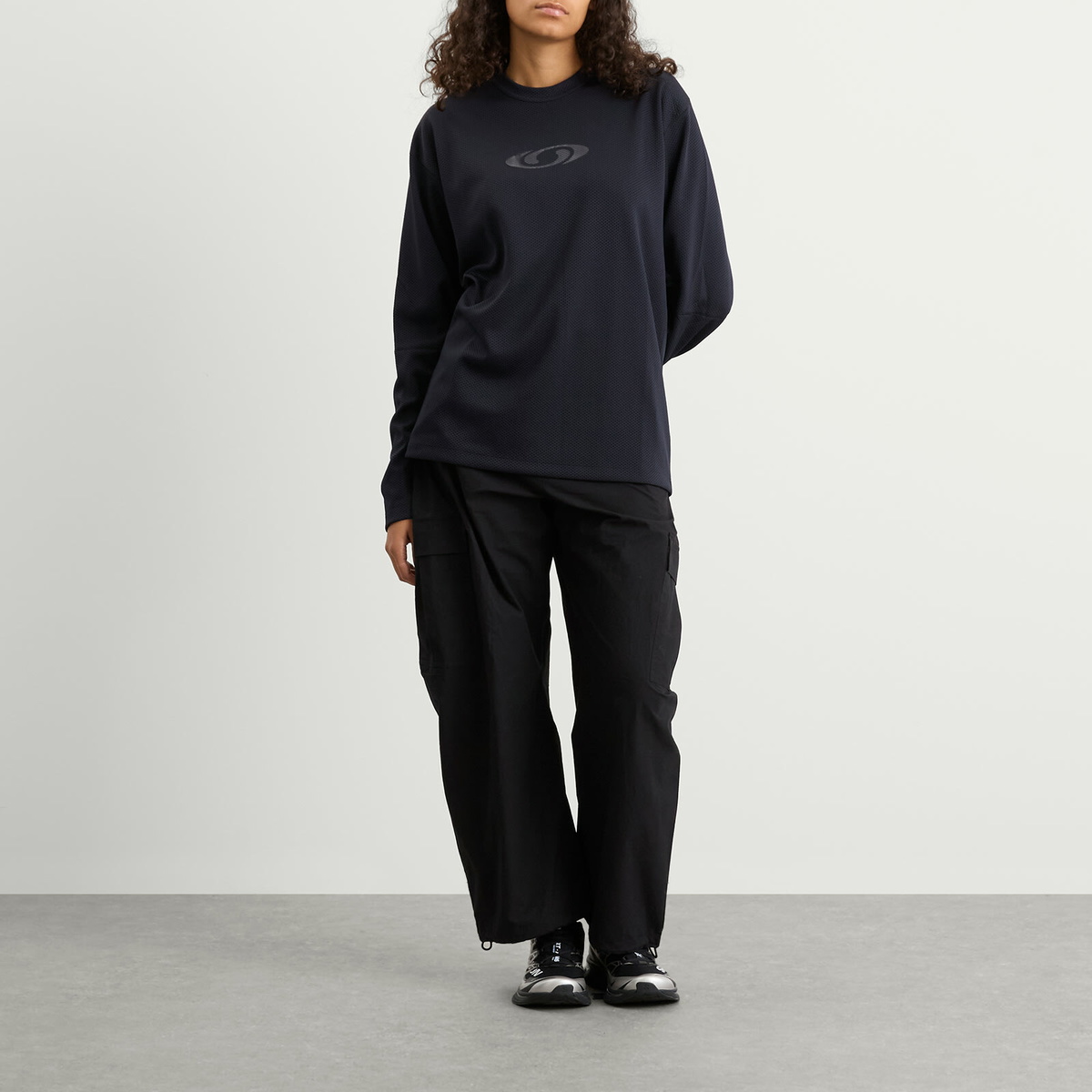 MM6 Maison Margiela Women's x Salomon Perforated Long Sleeve Sweater in Washed Black