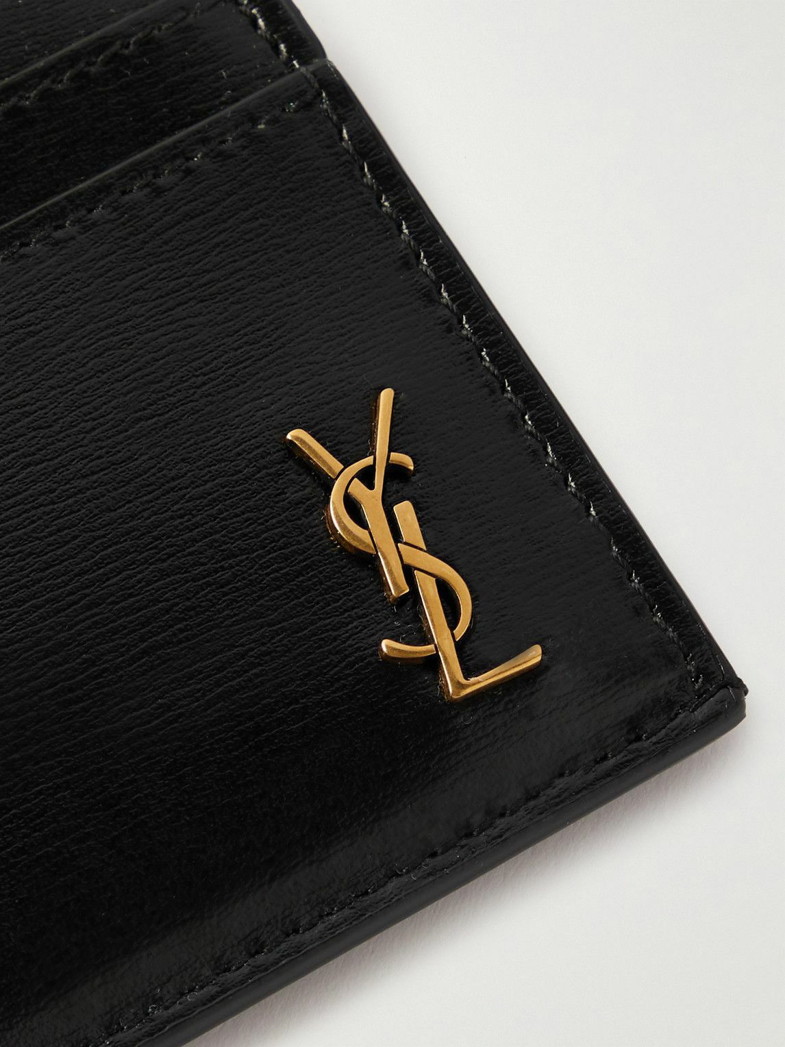 SAINT LAURENT: Tiny Cassandre credit card holder in crocodile print leather  - Black