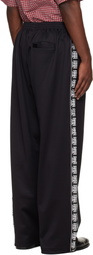 VETEMENTS Black Biker Cross Tape Track Pants