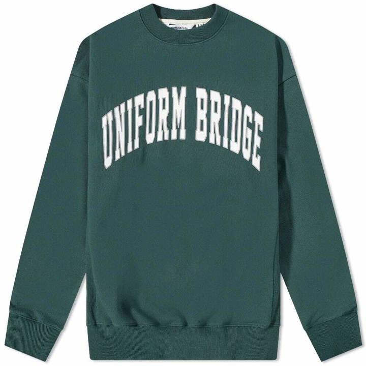 Photo: Uniform Bridge Men's Vintage Arch Logo Crew Sweat in Green