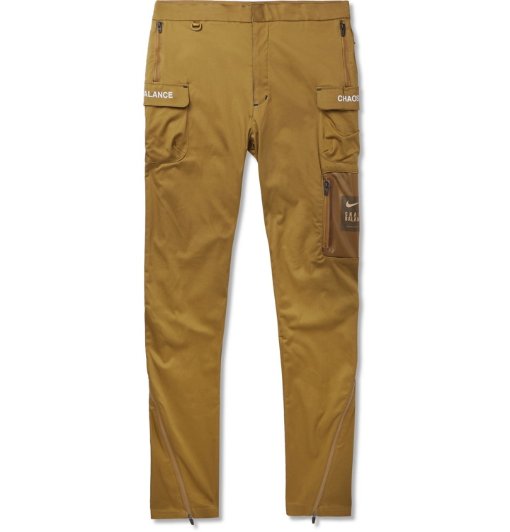 Photo: Nike - Undercover Tapered Logo-Print Cotton-Blend Trousers - Brown