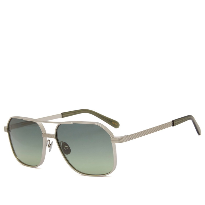 Photo: Moscot Mingle Sunglasses in Silver/Forest Wood
