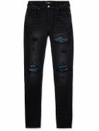 AMIRI - MX1 Skinny-Fit Panelled Distressed Jeans - Black