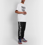 Vetements - Tapered Logo-Print Loopback Cotton-Jersey Sweatpants - Black