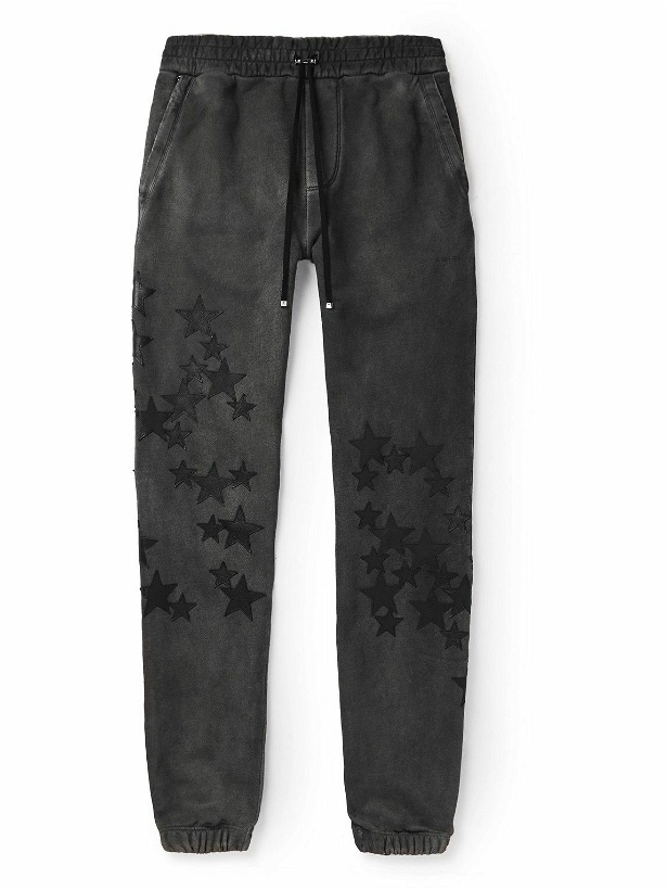 Photo: AMIRI - Pigment Spray Star Tapered Leather-Trimmed Cotton-Jersey Sweatpants - Black