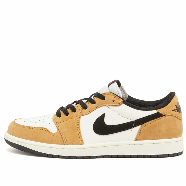 Photo: Air Jordan 1 Retro Low OG Sneaker in Sail/Harvest/Red
