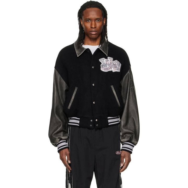Photo: We11done Black Faux-Leather Varsity Jacket