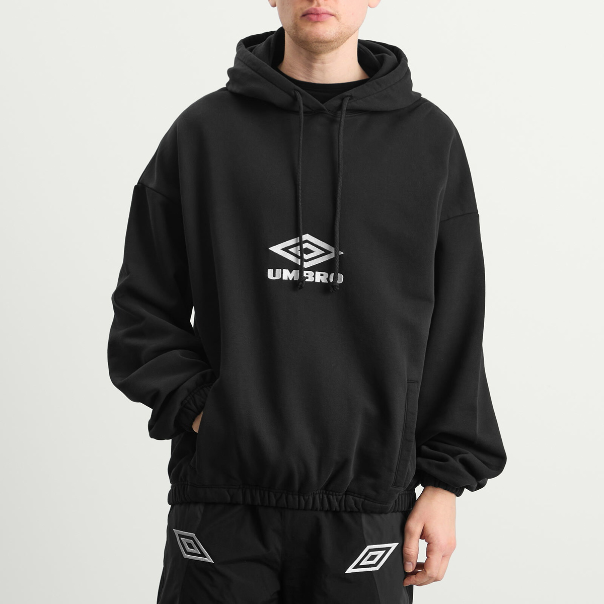 Umbro by Slam Jam Men's OG Logo Mask Hoodie in Washed Black