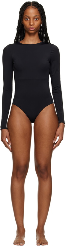 Photo: Stockholm (Surfboard) Club Black Cutout One-Piece Swimsuit