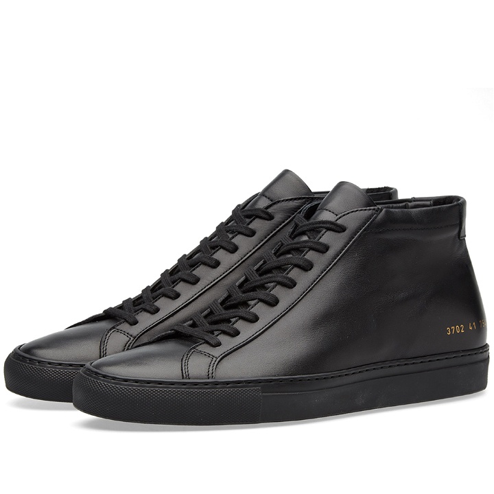 Photo: Woman by Common Projects Original Achilles Mid