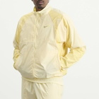 Nike Men's x Nocta Woven Track Jacket in Alabaster/Orange/Platinum