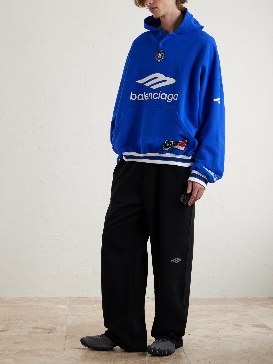 Balenciaga - Wide-Leg Logo-Print Appliquéd Cotton-Jersey Sweatpants - Black