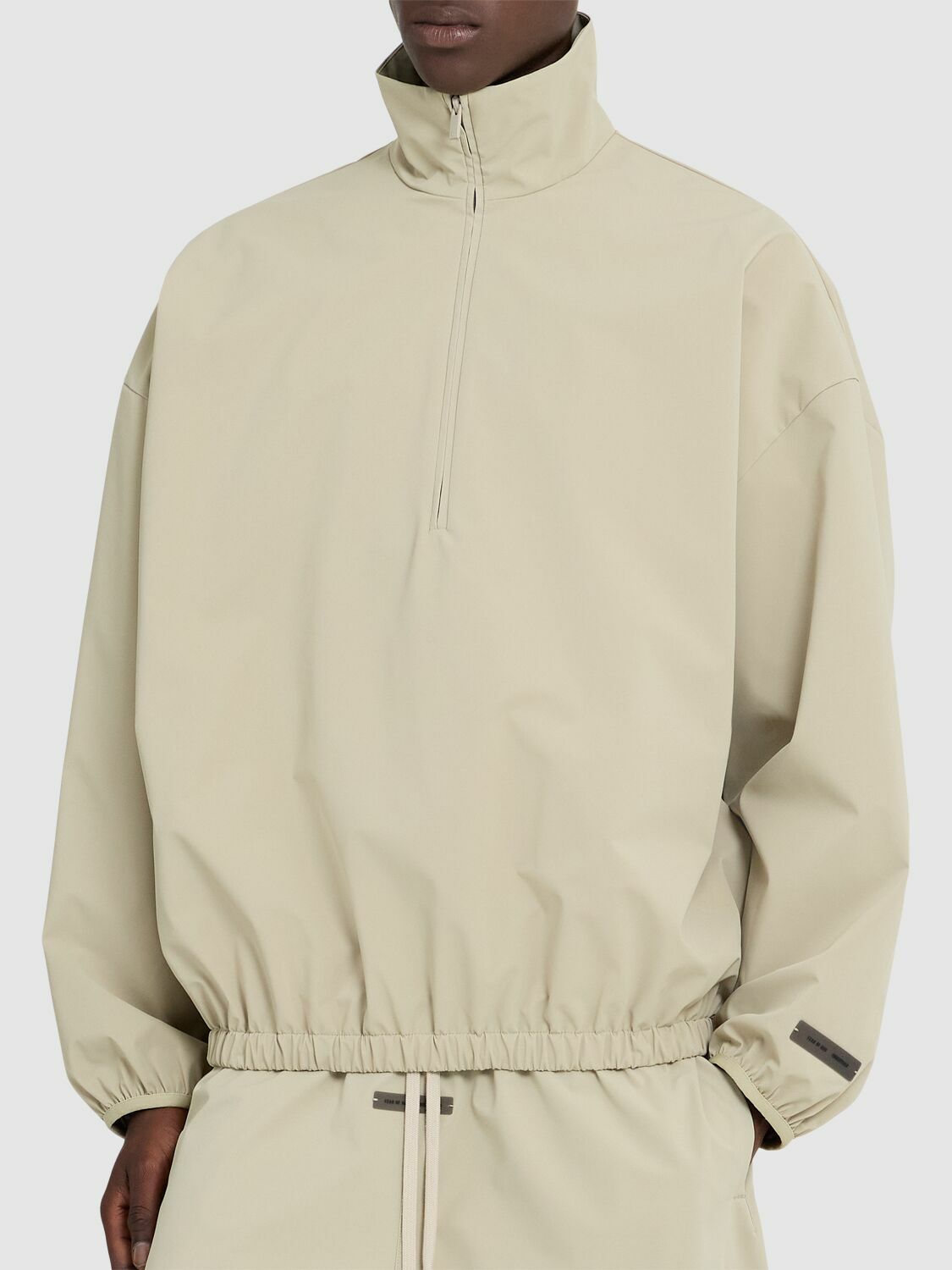 FEAR OF GOD ESSENTIALS Sporty Nylon Half Zip Sweatshirt Fear Of