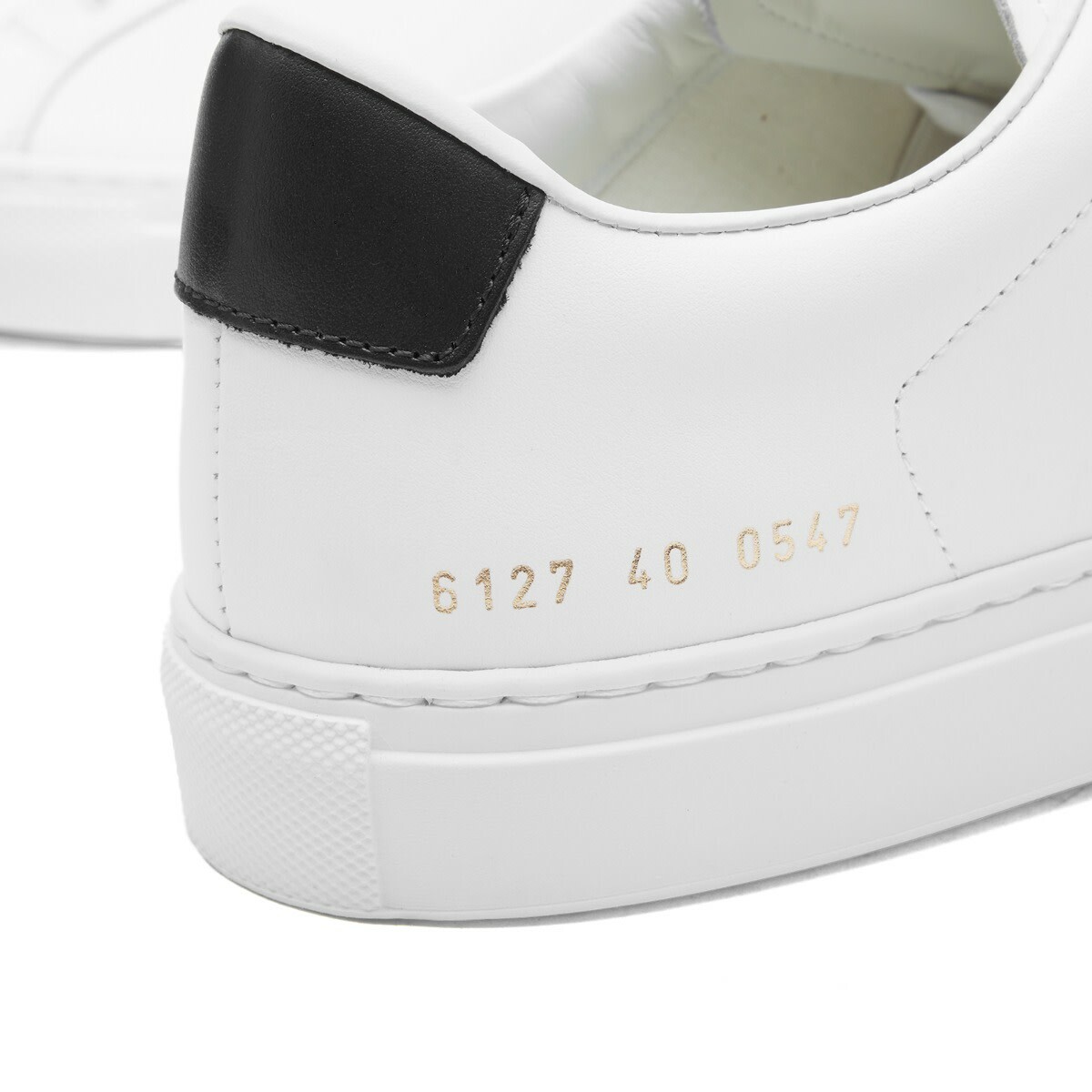 Woman by Common Projects Women's Retro Classic Trainers Sneakers in White/Black