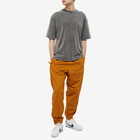 Nike Men's NRG Woven Track Pant in Desert Ochre/White