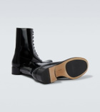 The Row Kai patent leather lace-up boots