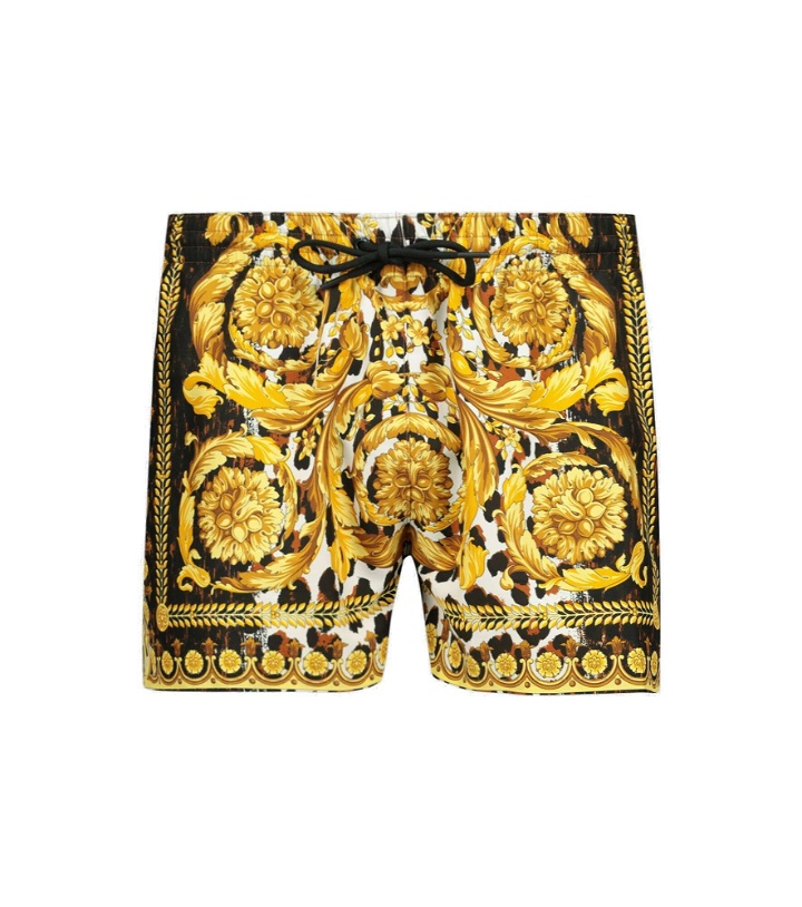 Photo: Versace - Baroque printed swim shorts