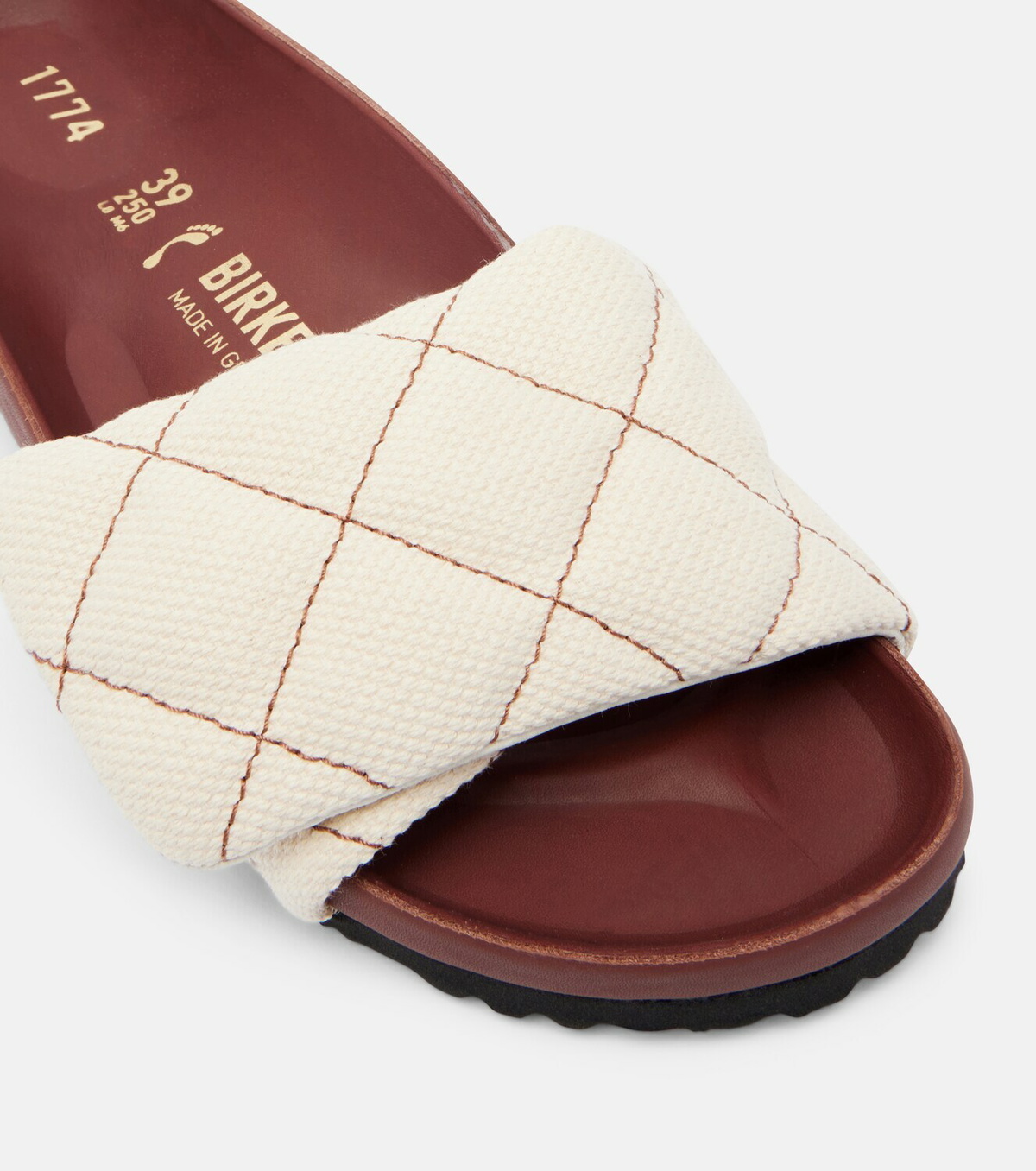 Birkenstock 1774 Sylt leather-trimmed quilted canvas slides