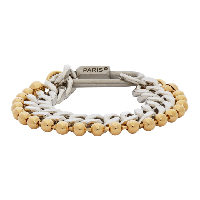 Photo: IN GOLD WE TRUST PARIS Silver and Gold Cuban Link Bracelet