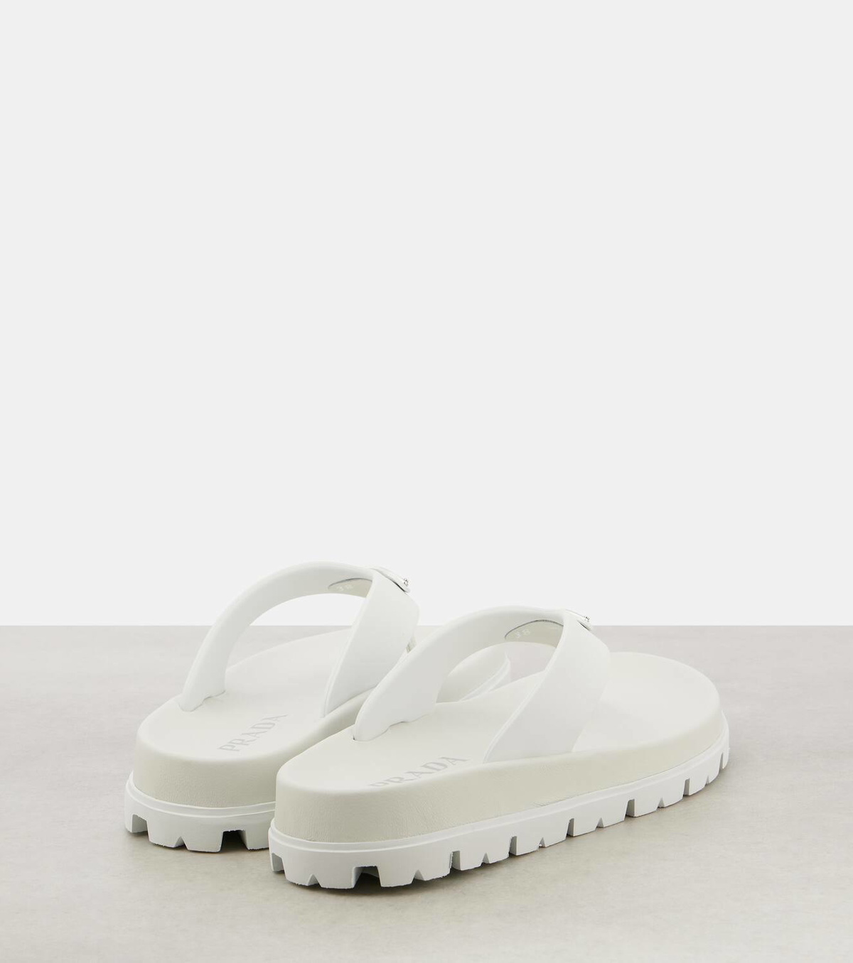 Prada Leather-trimmed thong sandals