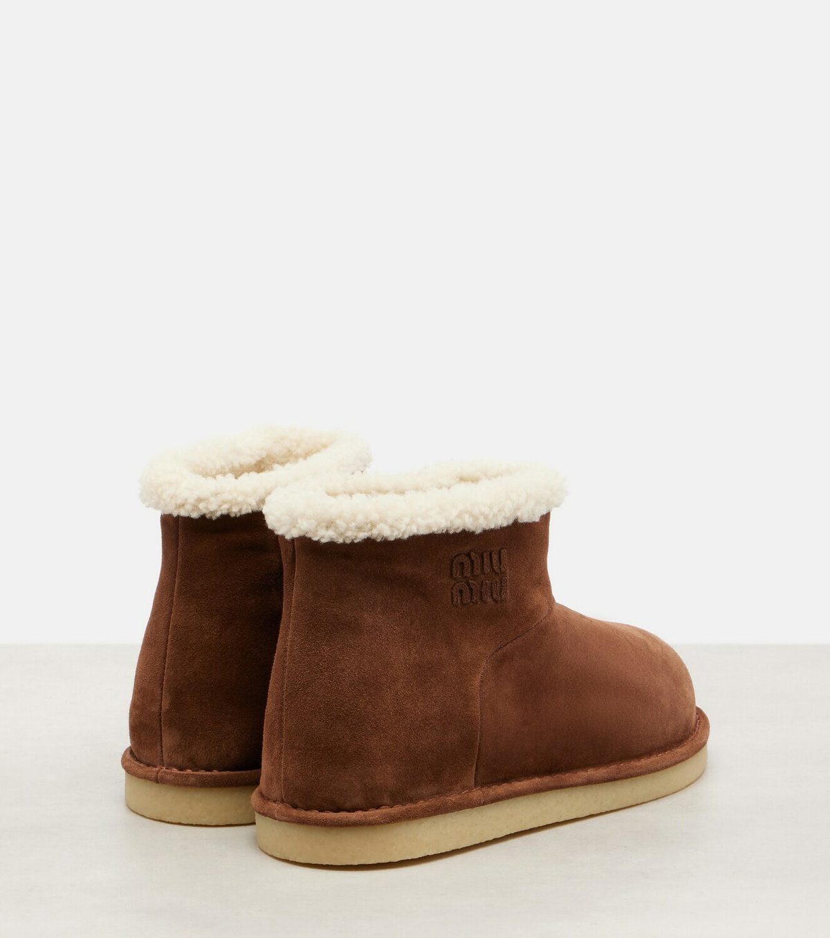Miu Miu Shearling-lined suede ankle boots