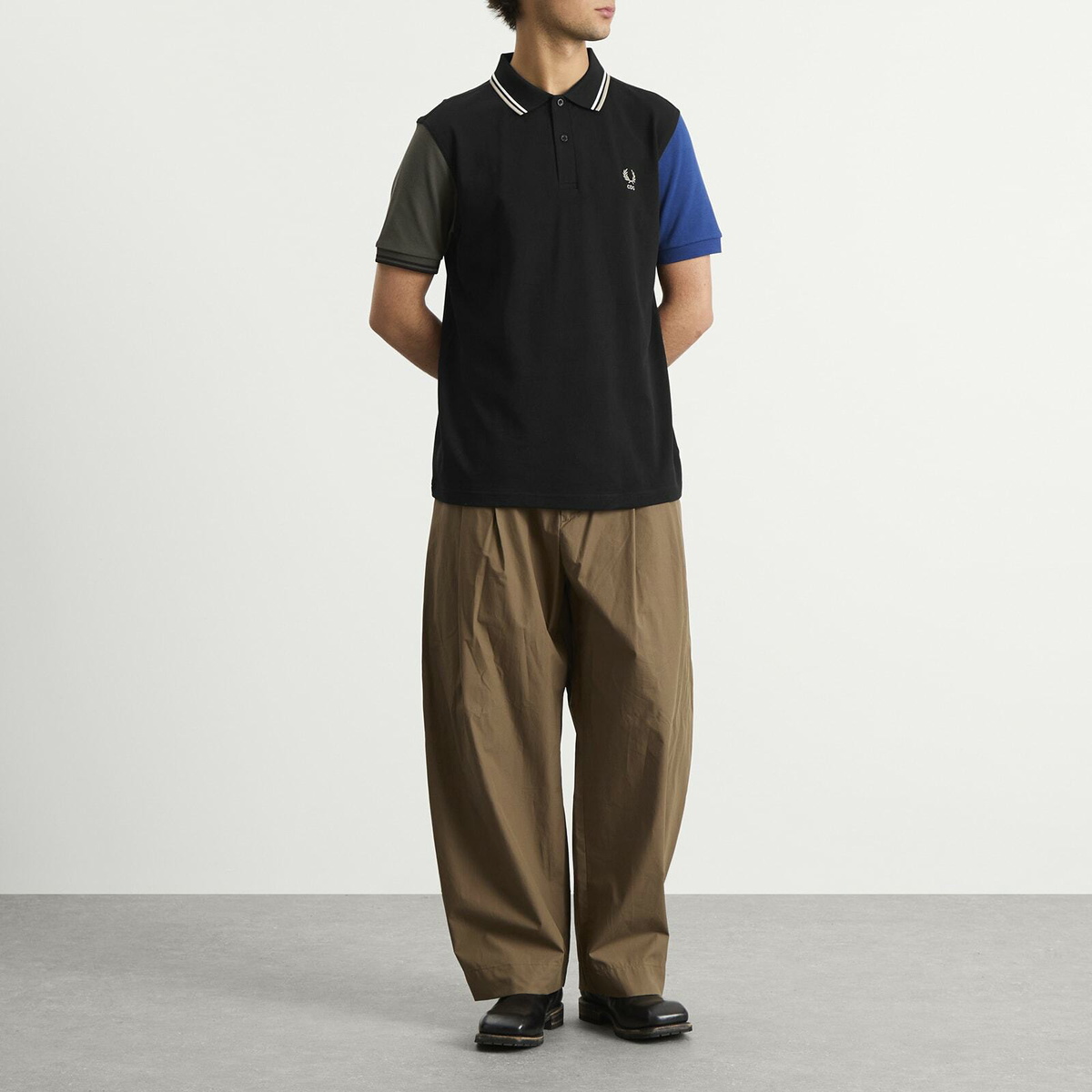 Comme des Garçons SHIRT Men's X Fred Perry Polo Shirt in Black