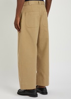 Studio Nicholson Pleated Wide-leg Trousers Tan