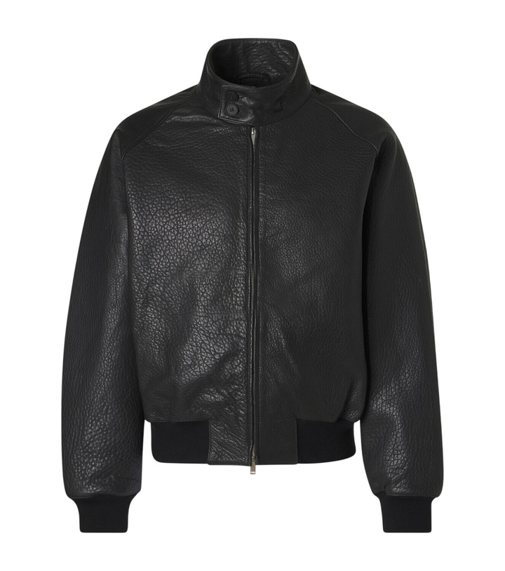 Photo: Studio Nicholson Over leather bomber jacket