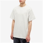 The North Face x KAWS S/S T-Shirt in Moonlight Ivory