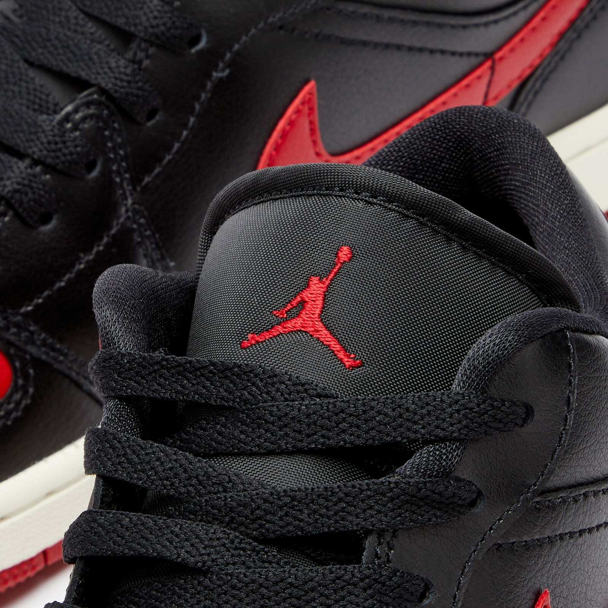 Air Jordan Women's W 1 Low Sneakers in Black/Gym Red/Sail