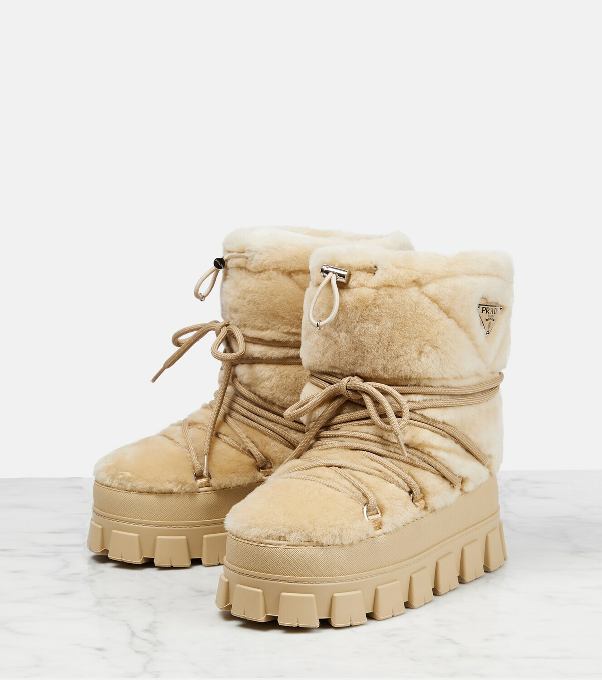 Prada Shearling and leather snow boots