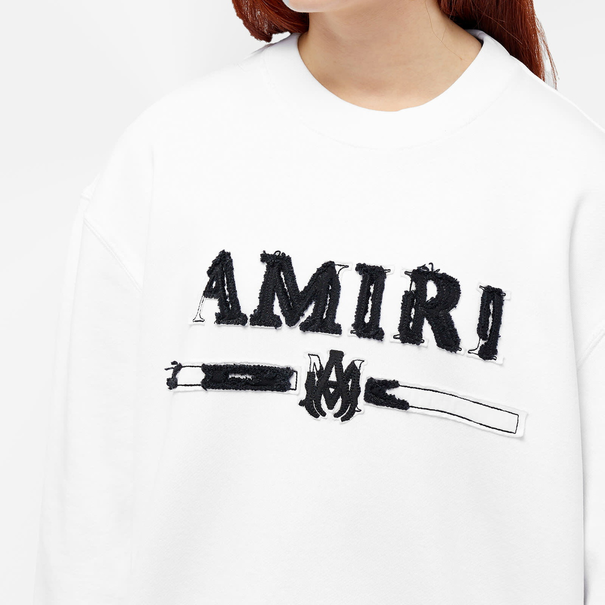 AMIRI ホワイト クルーネック トレーナー AMIRI Women's Applique Logo Crew Sweat in White Amiri