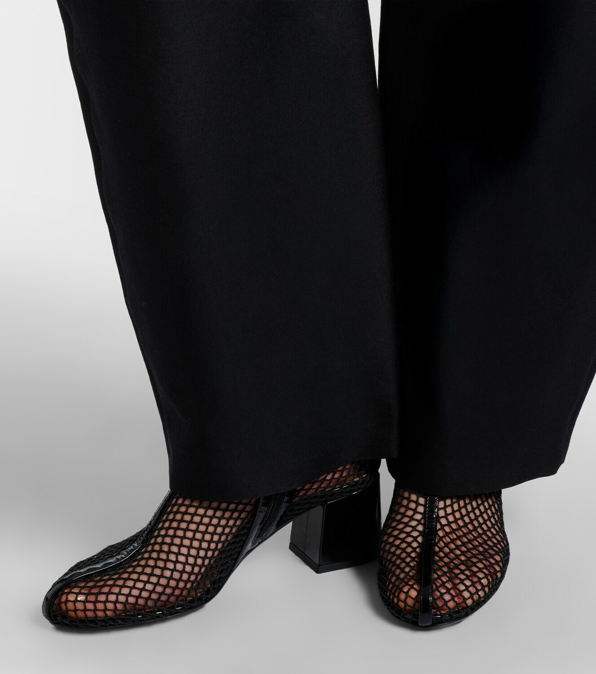 Alaïa Fishnet patent leather-trimmed ankle boots