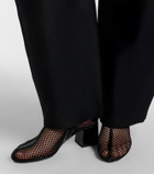Alaïa Fishnet patent leather-trimmed ankle boots