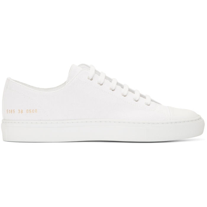 Photo: Common Projects White Canvas Tournament Low Cap Toe Sneakers 