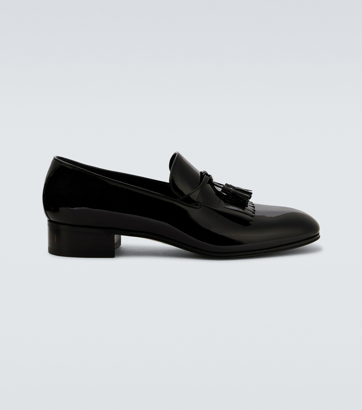 Gucci - Tasseled patent leather loafers