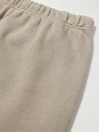 FEAR OF GOD ESSENTIALS - Slim-Fit Tapered Logo-Flocked Cotton-Blend Jersey Sweatpants - Brown