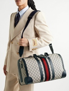 GUCCI - Leather- and Webbing-Trimmed Monogrammed Supreme Coated-Canvas Duffle Bag