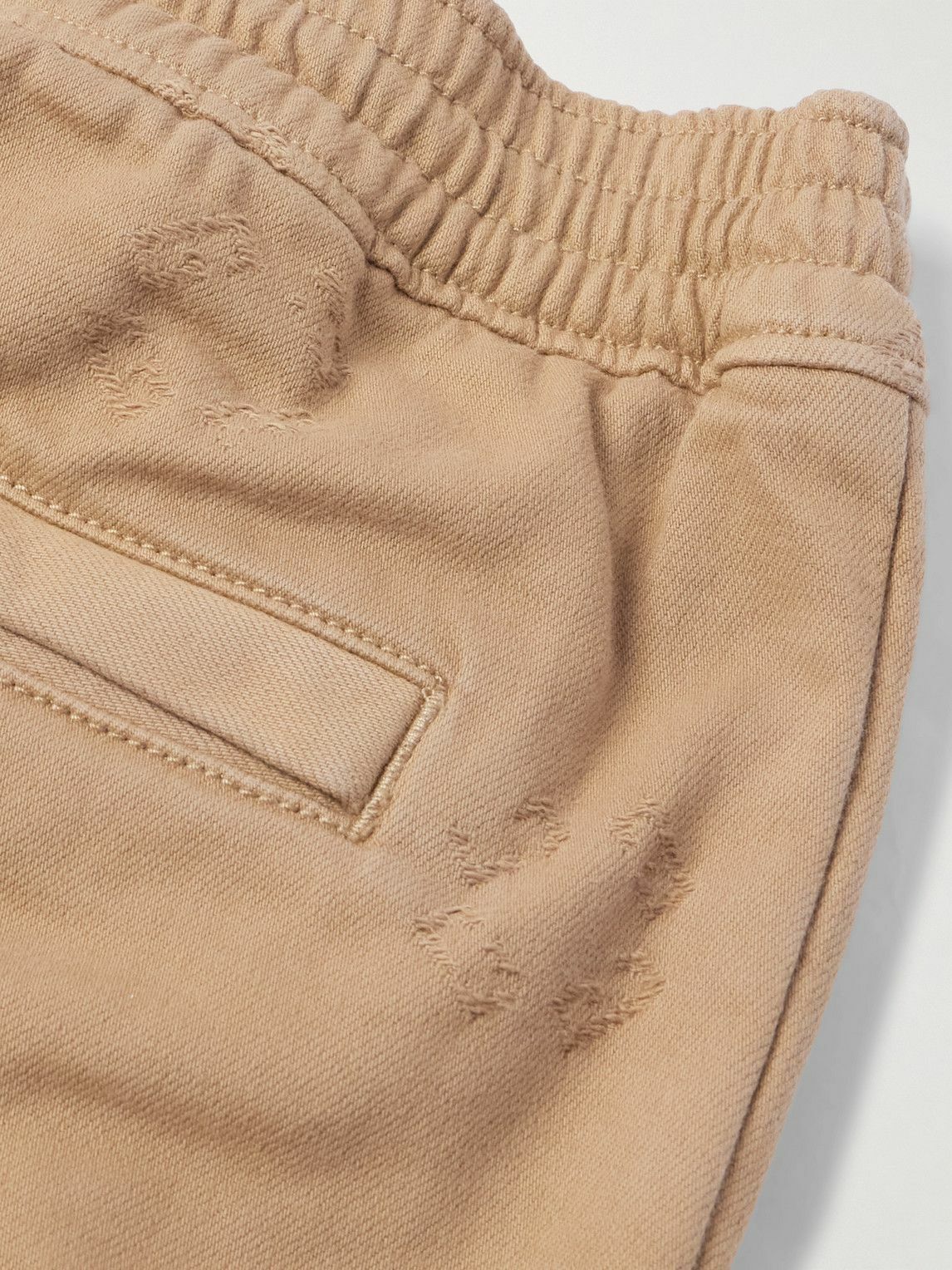 Givenchy - Tapered Appliquéd Logo-Jacquard Cotton-Blend Twill Trousers - Neutrals