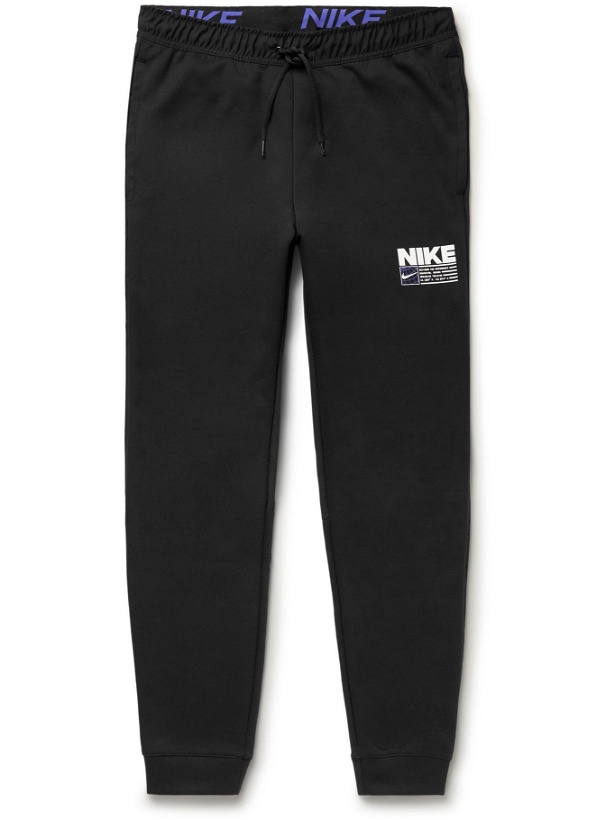 Photo: NIKE TRAINING - Tapered Logo-Print Dri-FIT Sweatpants - Black