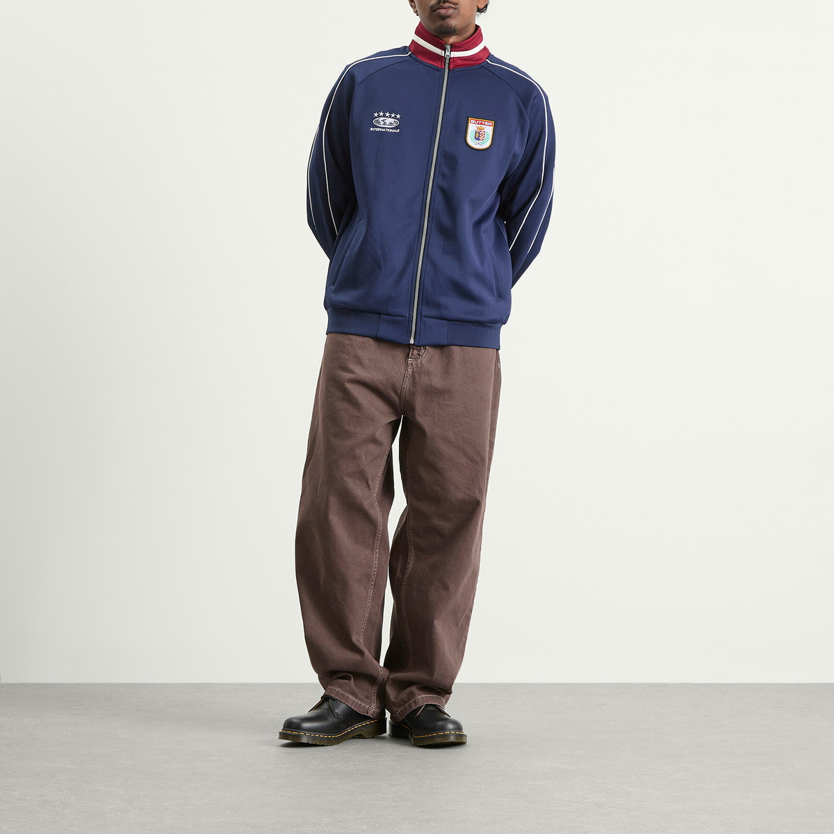 Butter Goods Men's Internationale Track Jacket in Navy