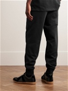 Y-3 - Tapered Logo-Appliquéd Organic Cotton-Jersey Sweatpants - Black
