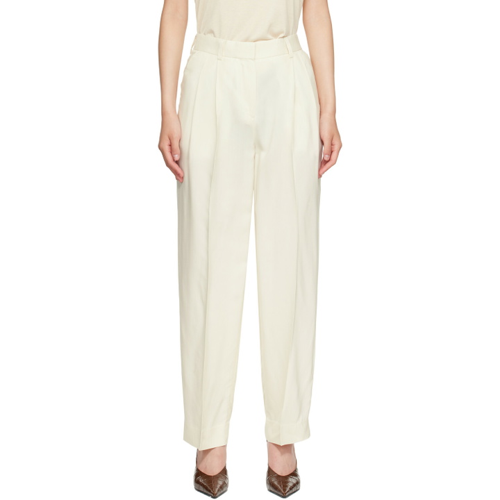 Photo: TOTEME Off-White Double-Pleat Fluid Trousers