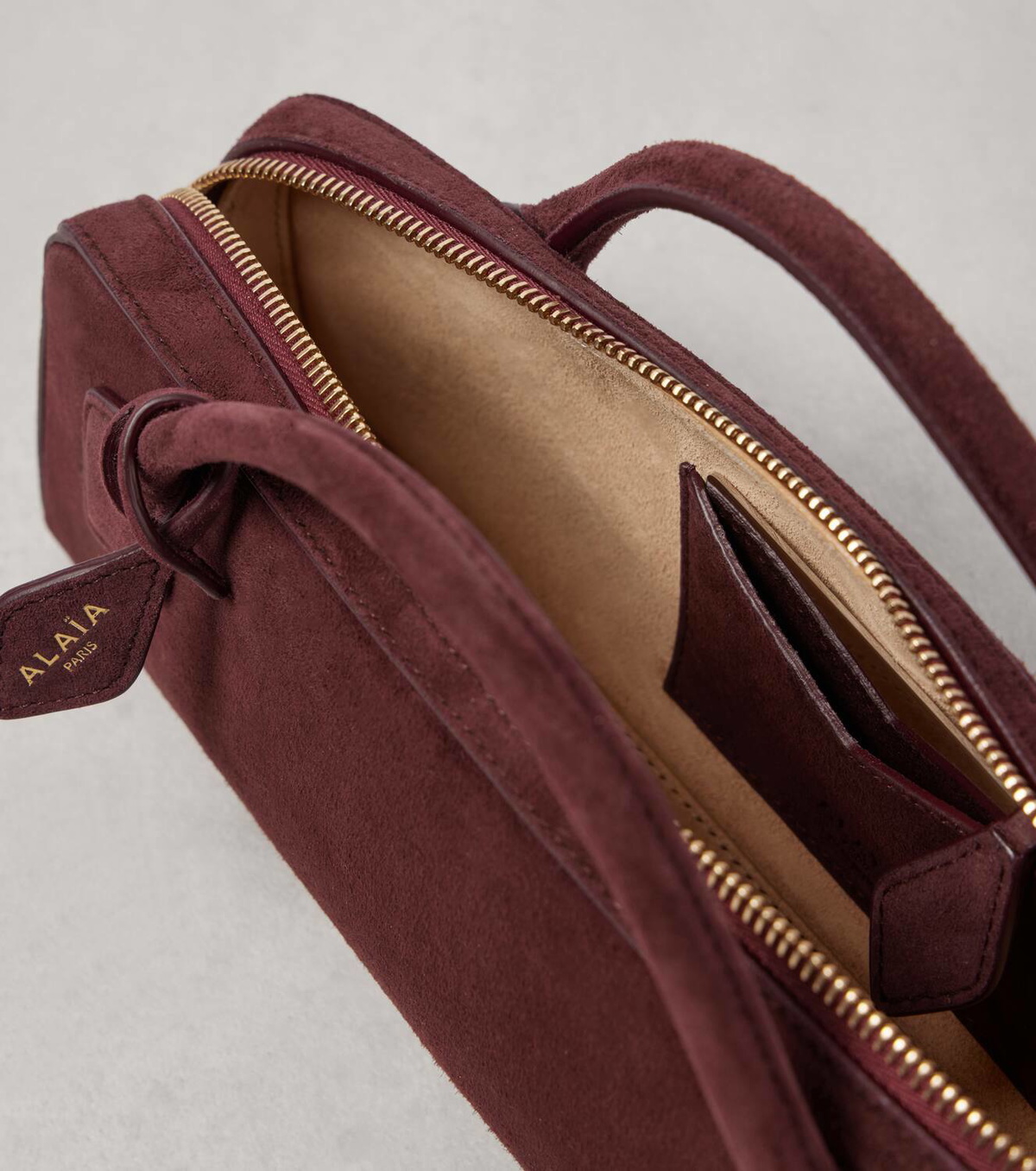 Alaïa Le Teckel suede clutch