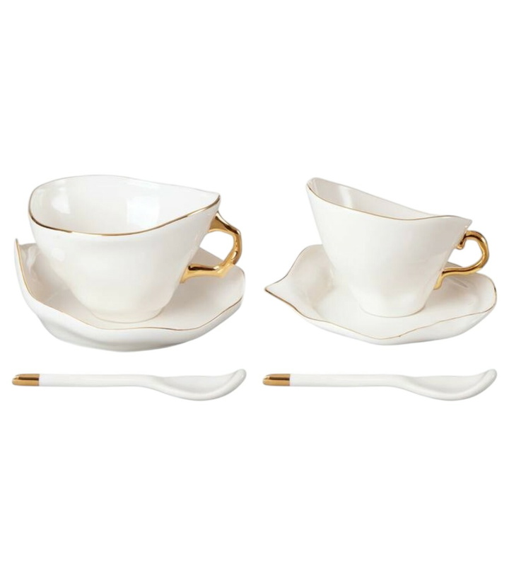 Photo: Seletti Meltdown set of 2 teacups, saucers, and spoons by JordanLuca